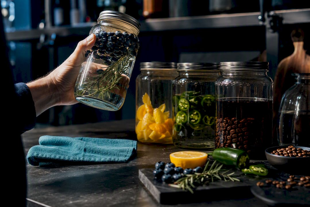 Infusion jars with fruit herbs and spices