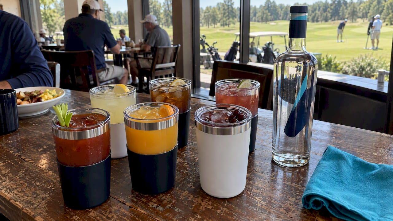 Six golf cocktails beside Broken Tee Vodka