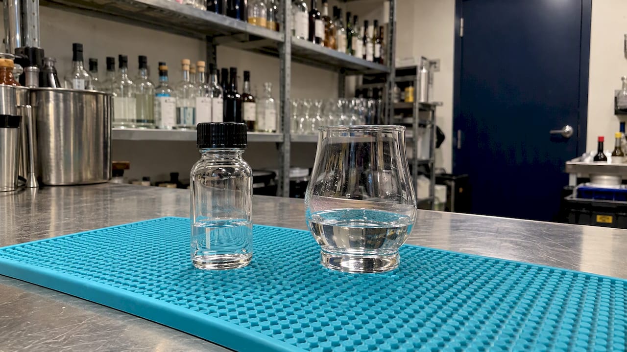 Neutral spirit sample beside finished vodka
