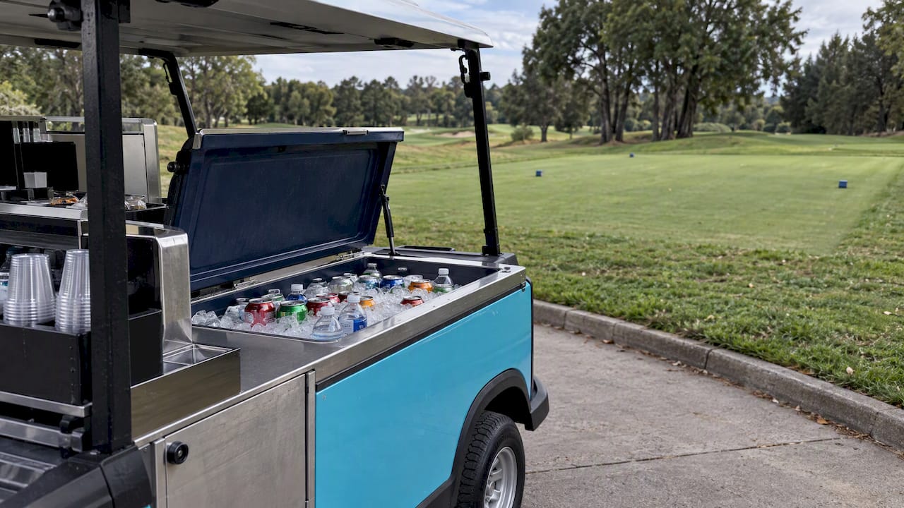 Golf beverage cart stocked for play